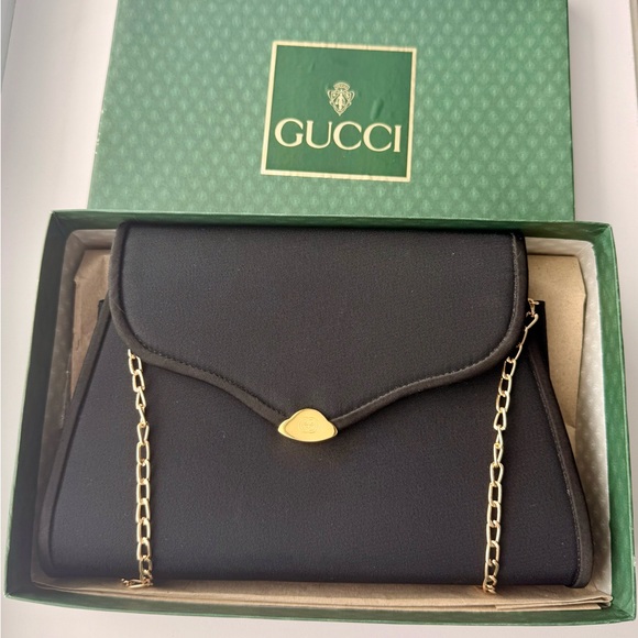 Gucci Handbags - Gucci Black Clutch with Gold Chain